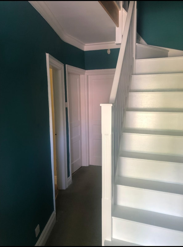Painters and Decorators in Rotherham - hallway painted turquoise with white gloss