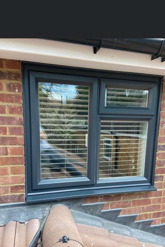 Painters and Decorators Rotherham - window frame painted graphite grey